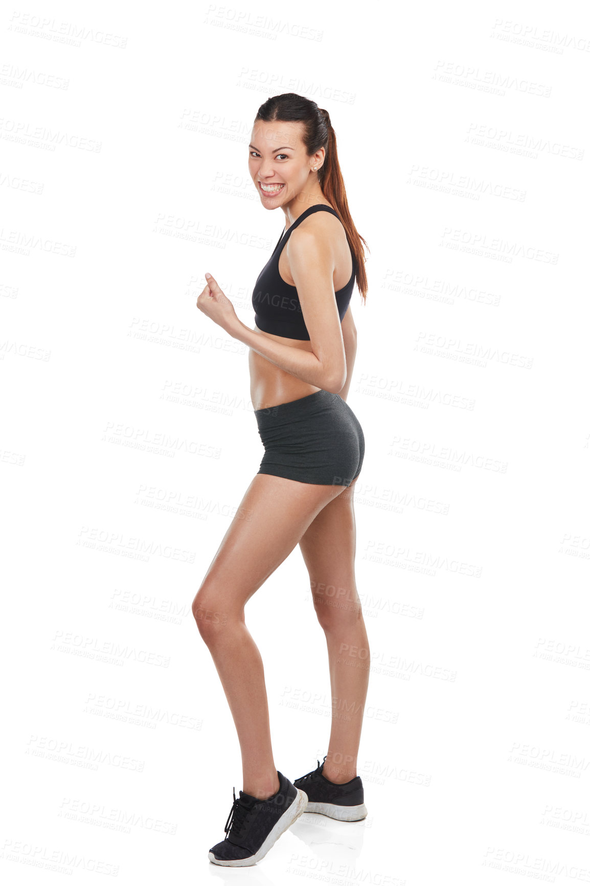 Buy stock photo Full length portrait of a fit, young woman flexing in sportswear isolated on white