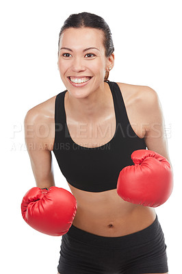 Buy stock photo Cropped shot of a young female athlete boxing against a white background