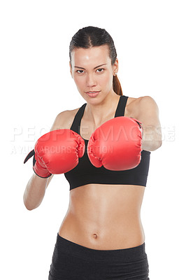 Buy stock photo Cropped portrait of a young female athlete boxing against a white background
