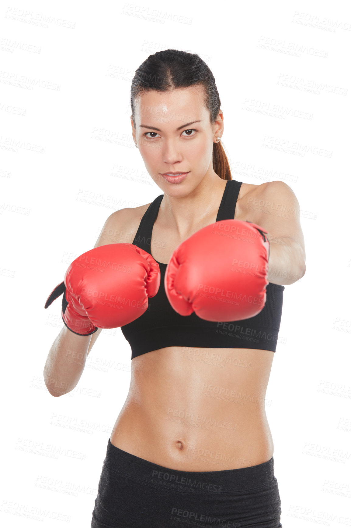 Buy stock photo Cropped portrait of a young female athlete boxing against a white background