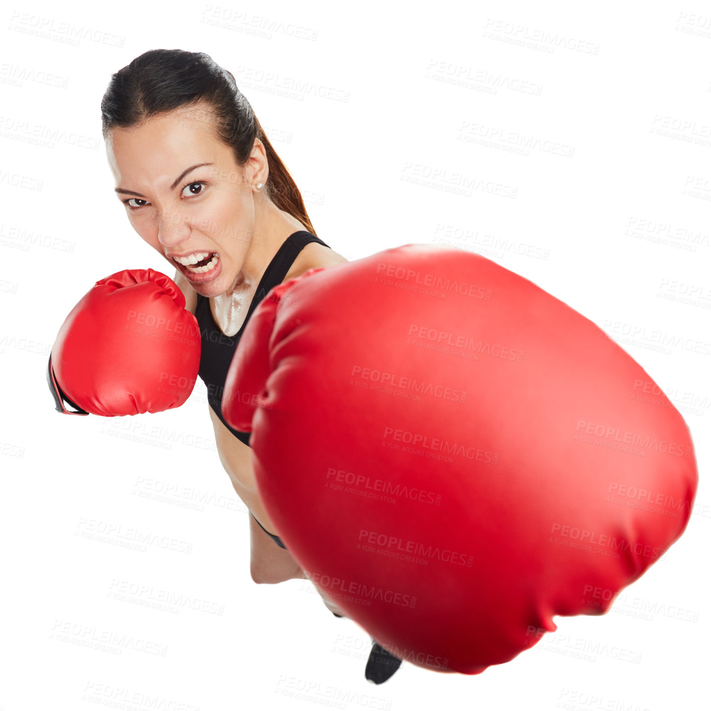 Buy stock photo High angle portrait of a young female athlete boxing against a white background