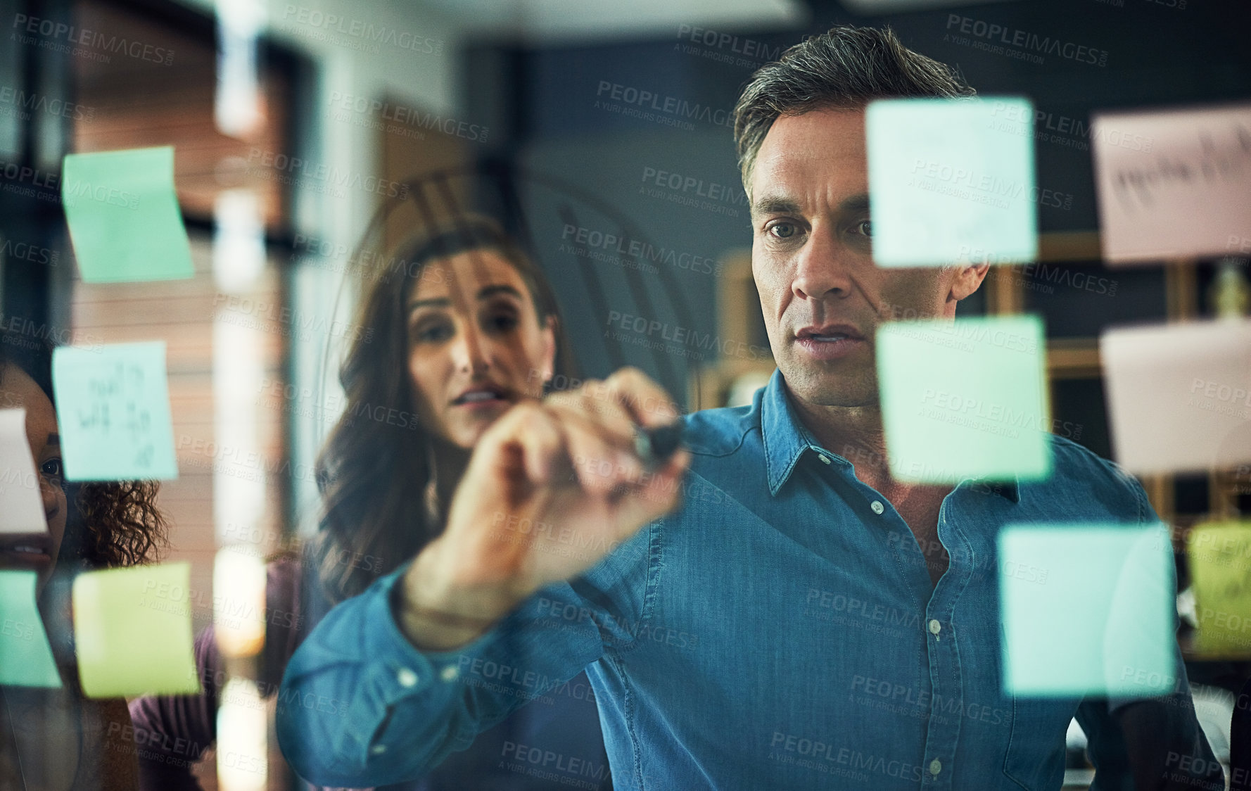 Buy stock photo Businessman, writing or team with glass board for brainstorming, project planning or tasks at office. Man, coach and pie chart with employees, graph or stats for company vision, review or performance