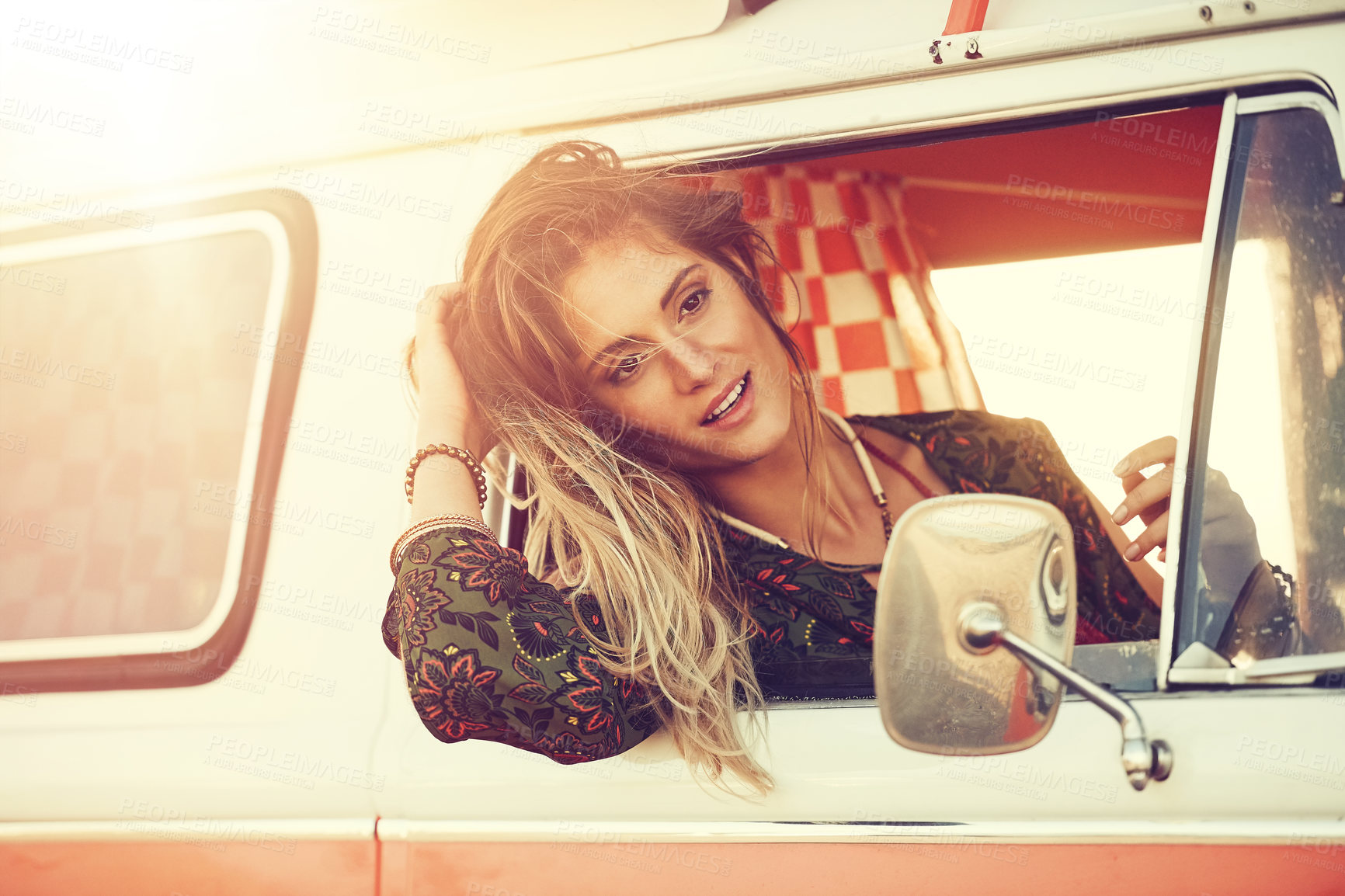 Buy stock photo Shot of a gorgeous young woman enjoying a roadtrip on her own