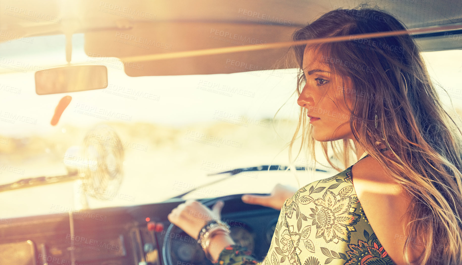 Buy stock photo Shot of a gorgeous young woman enjoying a roadtrip on her own