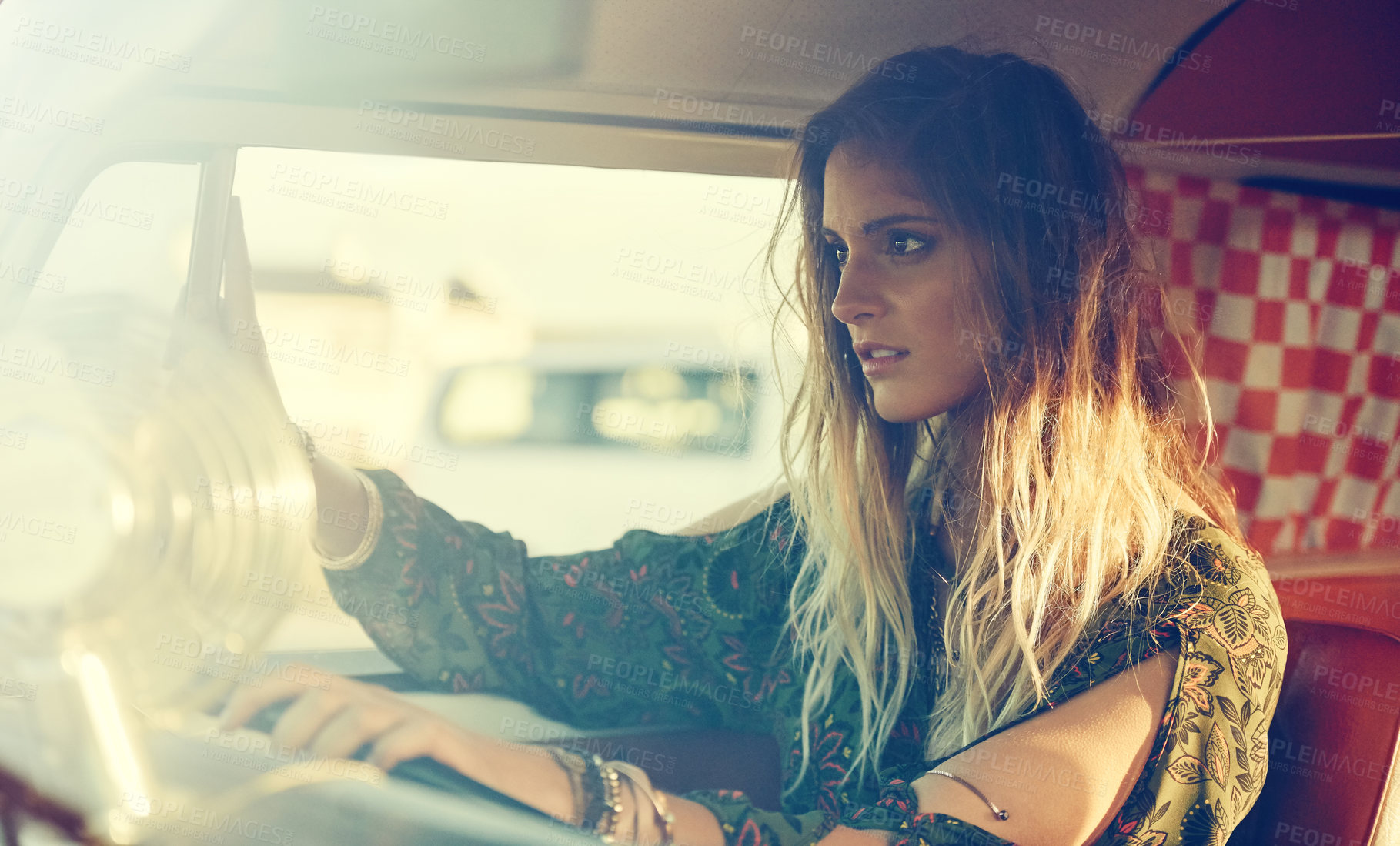 Buy stock photo Shot of a gorgeous young woman enjoying a roadtrip on her own