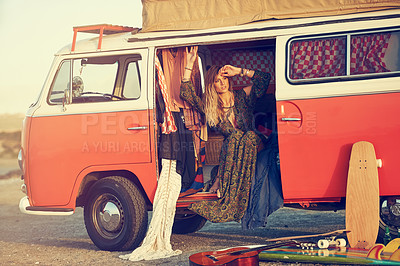 Buy stock photo Shot of a gorgeous young woman enjoying a roadtrip on her own