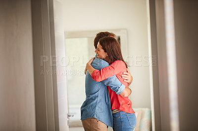 Buy stock photo Shot of an affectionate mature couple bonding together at home
