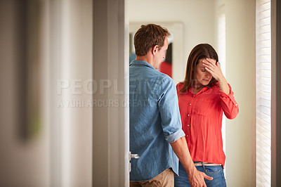 Buy stock photo Shot of a mature couple having relationship problems at home
