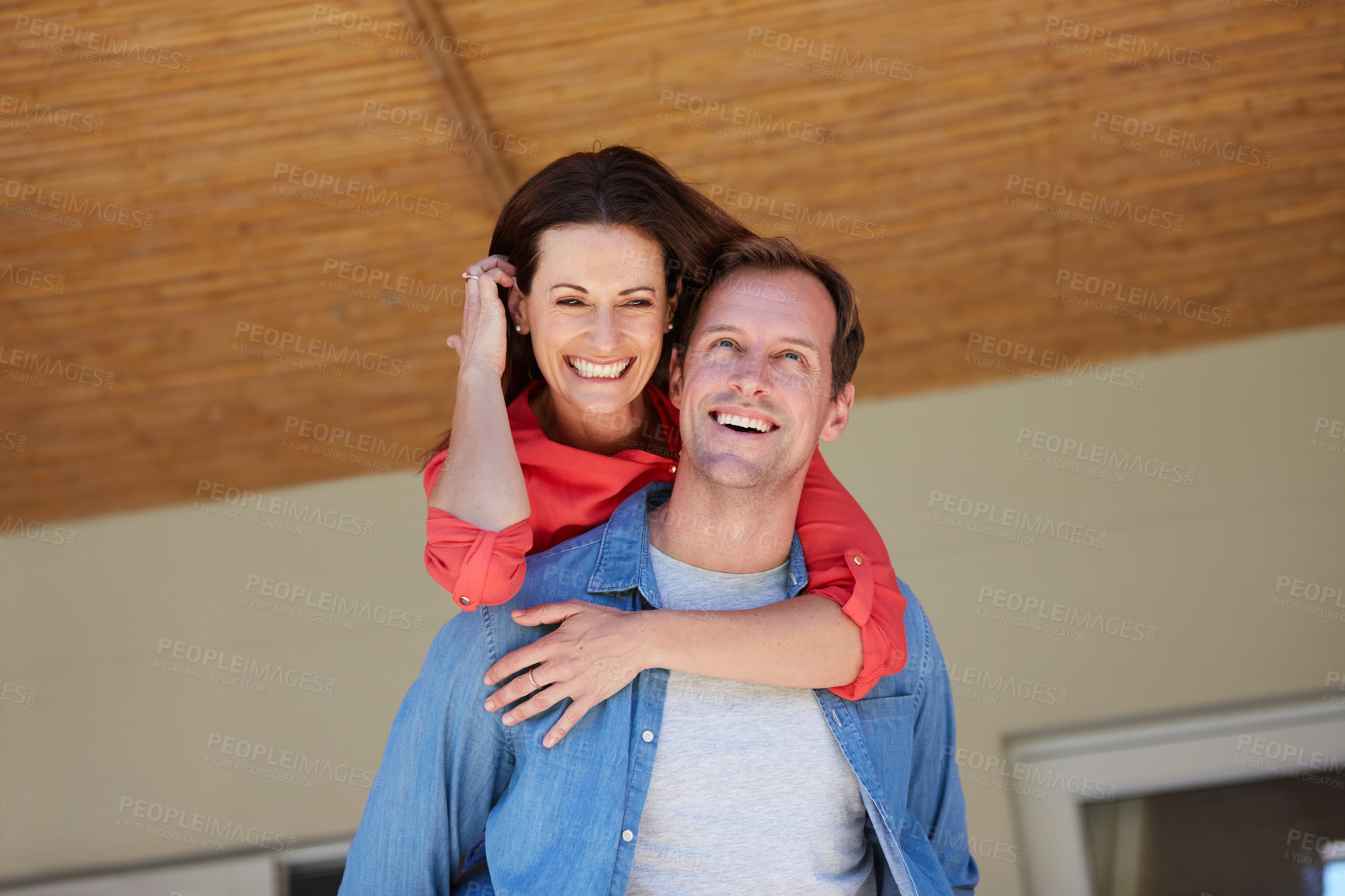 Buy stock photo Shot of a mature couple enjoying the day at home together