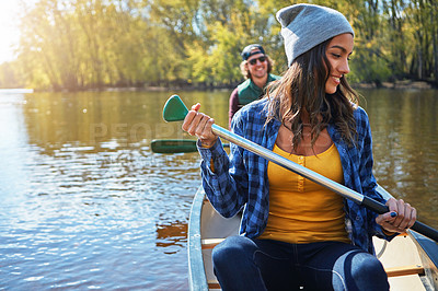 Buy stock photo Couple, canoe and lake or forest holiday exploring or rowing outdoor, environment or journey. Man, woman and happy or travel weekend or river morning at vacation resort in Colorado, calm or island