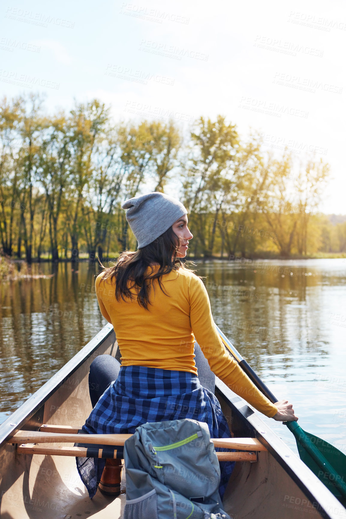 Buy stock photo Woman, water and thinking on lake canoeing, wellness hobby and single blade paddle for rowing. Vacation, relax and explore exercise on travel in summer, canoe boat and trees on river for fitness