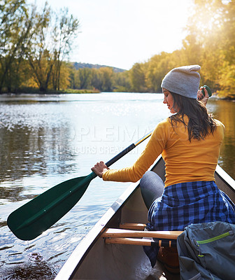 Buy stock photo Woman, back and canoeing in nature on water, wellness hobby and backpack for supplies with paddle for rowing. Vacation, relax and explore exercise on travel holiday, canoe boat and trees on river