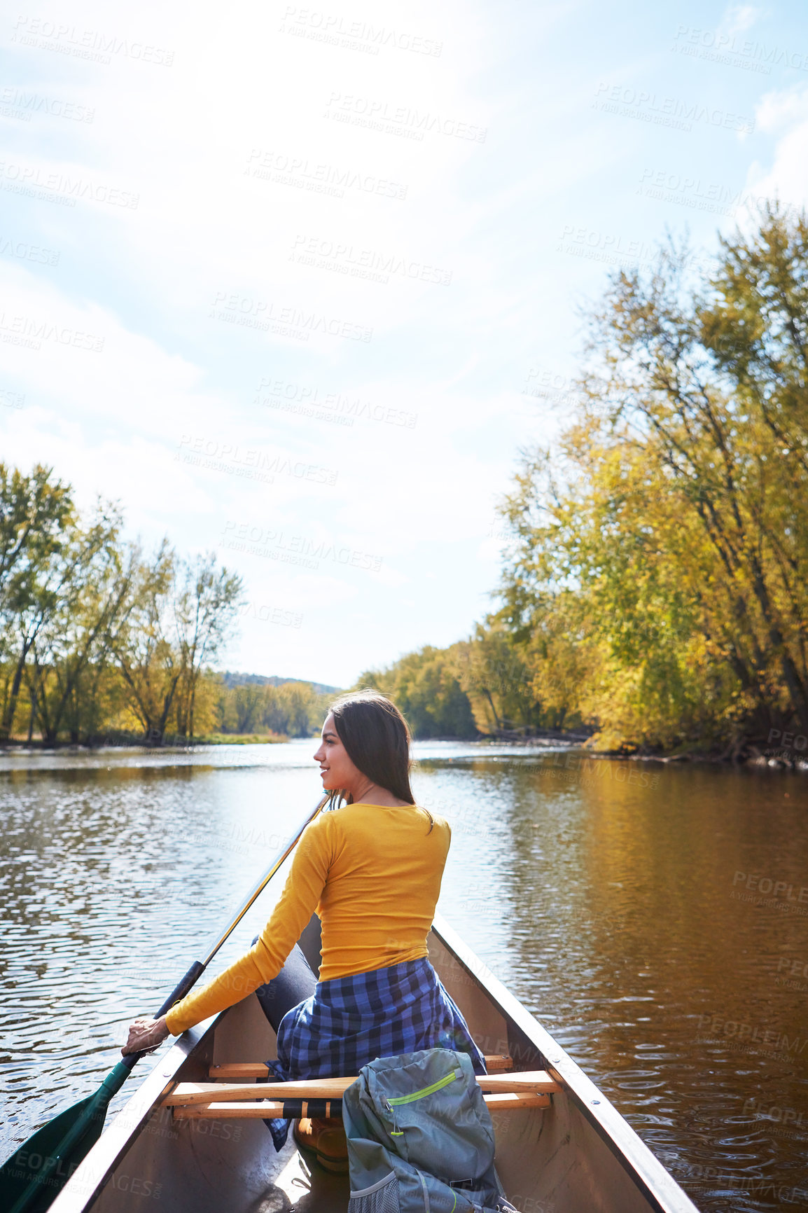 Buy stock photo Woman, back and canoeing paddle in nature on lake, wellness hobby and backpack for supplies and rowing for water sport. Vacation, relax and explore exercise on travel holiday, canoe boat and trees