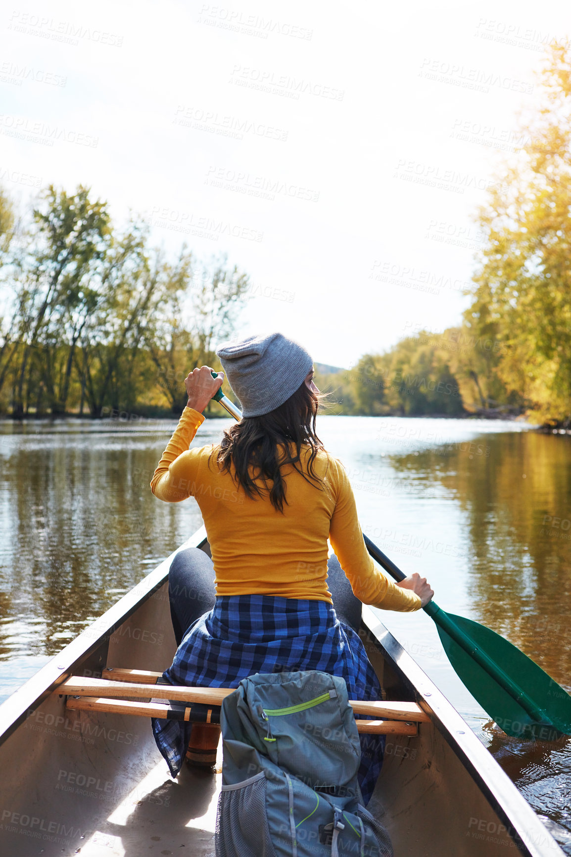 Buy stock photo Woman, back and canoeing for fitness sport in nature, wellness hobby and single blade paddle for rowing. Vacation, relax and explore exercise on travel for summer holiday, canoe boat and river