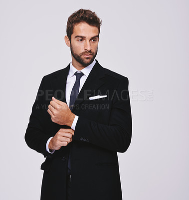 Buy stock photo Business, thinking and man with ideas, suit and executive agent isolated against a grey studio background. Male person, thoughtful and entrepreneur with formal wear, trendy clothes and stylish outfit