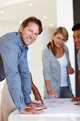 Buy stock photo Architect, blueprint and portrait with smile, meeting and collaboration for business and communication. Workforce, paperwork and brainstorming for discussion together with engineer, planning and desk