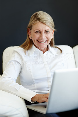 Buy stock photo Mature businesswoman, portrait and laptop on couch, planning and internet for b2b online communication. Female person, CEO and proud of startup company, finance and happy accountant for ideas on web