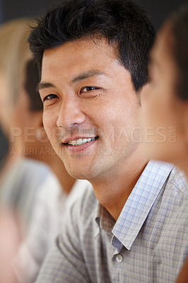 Buy stock photo Meeting, teamwork and asian man in office for discussion, conference or working on creative project. Smile, professional and Chinese employee for workshop, business or planning at design agency
