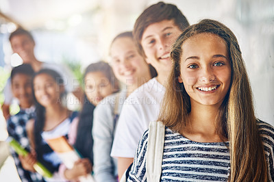 Buy stock photo Portrait of a group of happy schoolchildren standing in a line outside their classroom