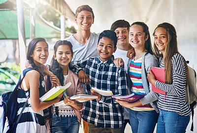 Buy stock photo Portrait of a group of happy schoolchildren standing together in the hall outside their classroom