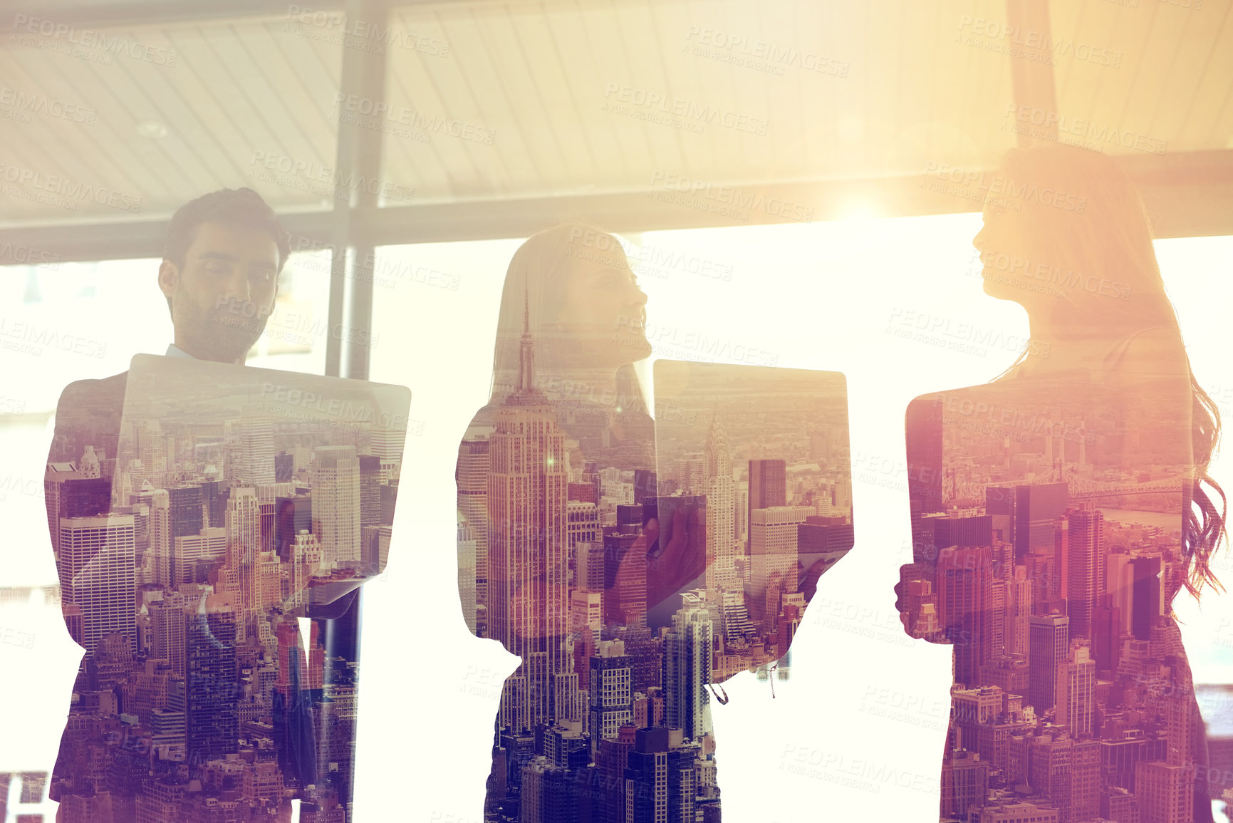 Buy stock photo Double exposure shot of three coworkers meeting with their laptops in the lobby