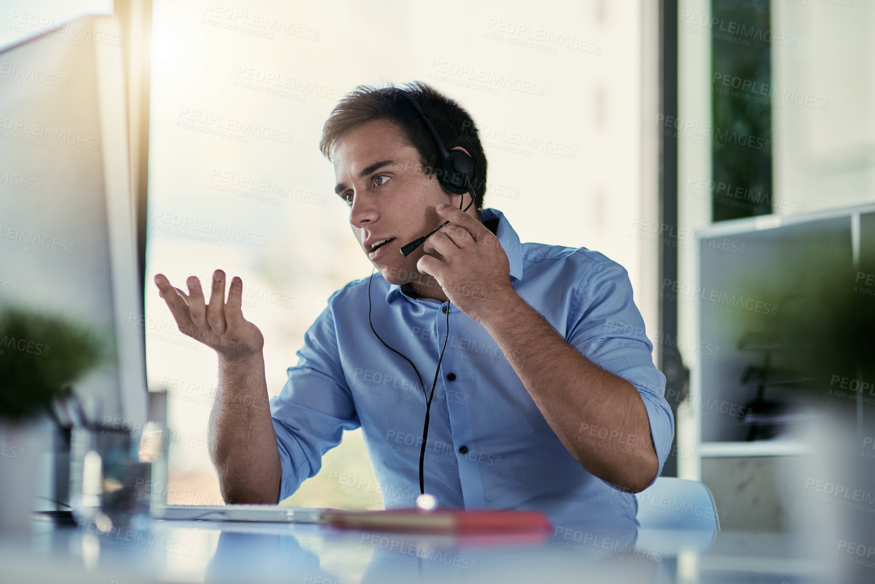 Buy stock photo Cropped shot of a call centre agent working in an office