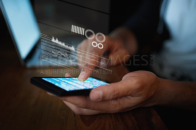 Buy stock photo Closeup shot of an unidentifiable hacker using a cellphone in the dark