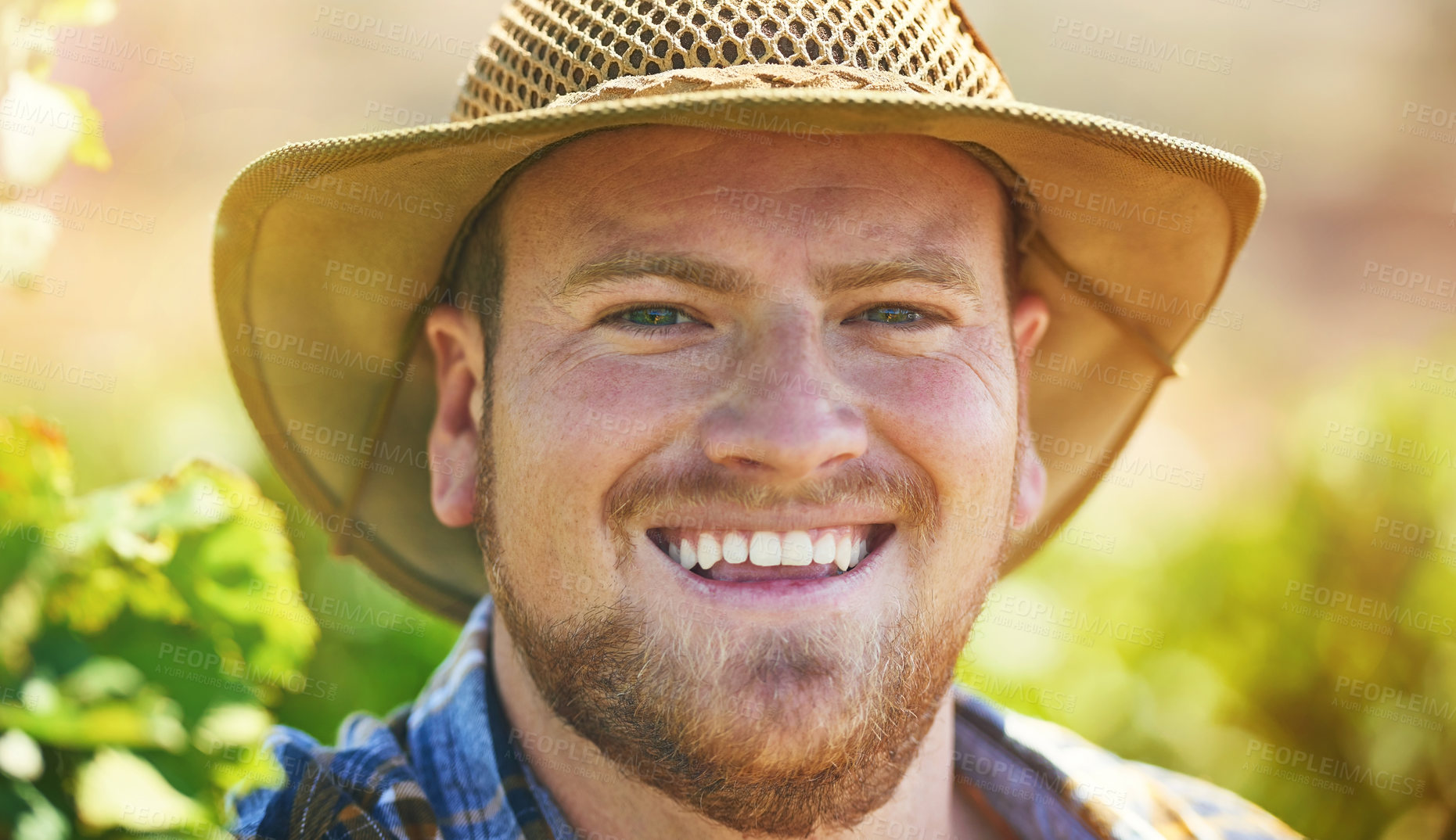 Buy stock photo Farmer, man and outdoor in portrait at vineyard with smile for growth, development or progress in summer. Person, agriculture and hat for grapes with sustainability, happy or quality control in Spain