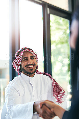 Buy stock photo Handshake, islamic businessman and office for meeting, keffiyeh and deal in workplace. Partnership, finance and success for male person in Saudi Arabia, agreement and oil investment for company