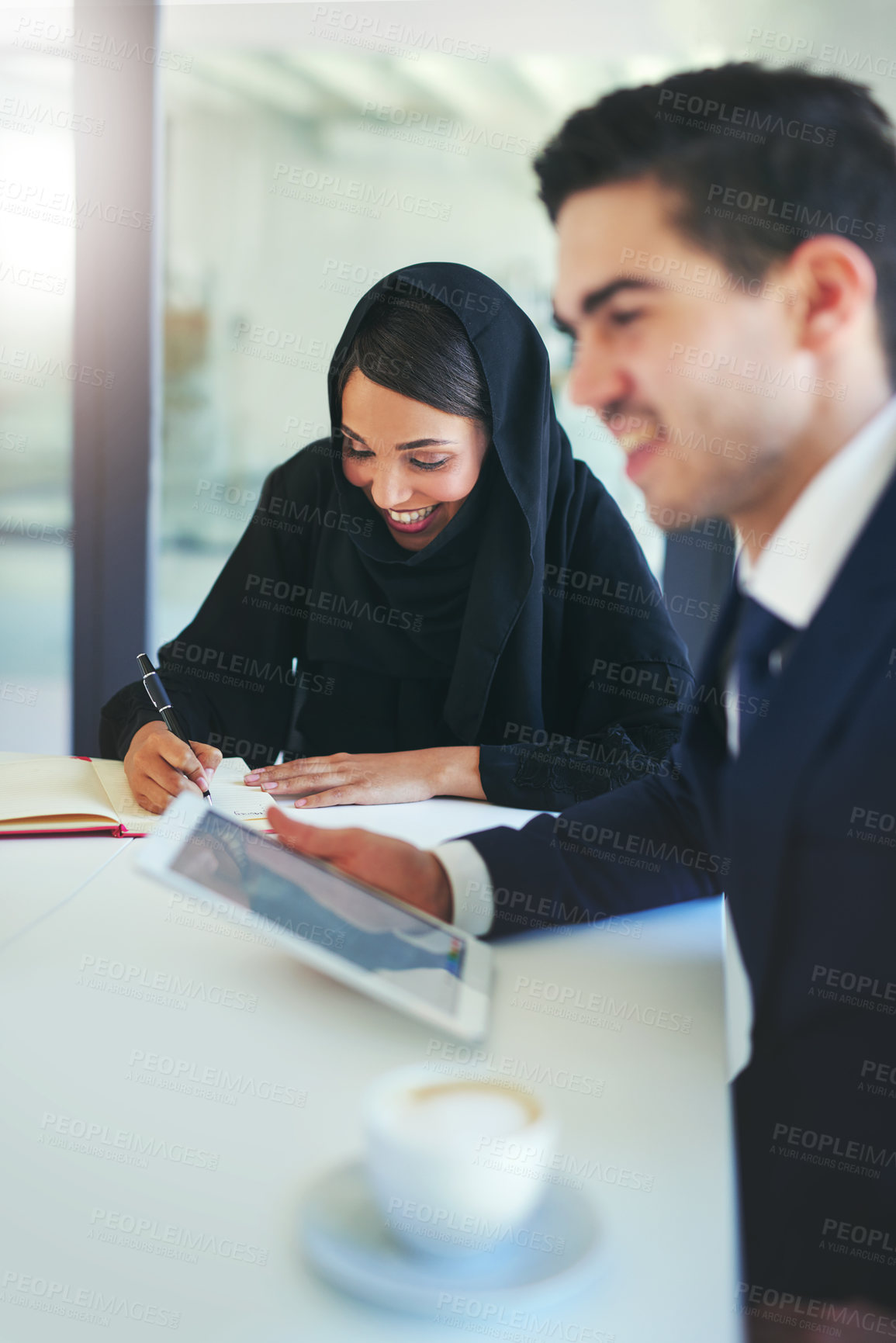 Buy stock photo Islamic, teamwork and business people in office with tablet, planning and meeting for corporate project. Arabic company, man manager and muslim woman as personal assistant, writing notes and working