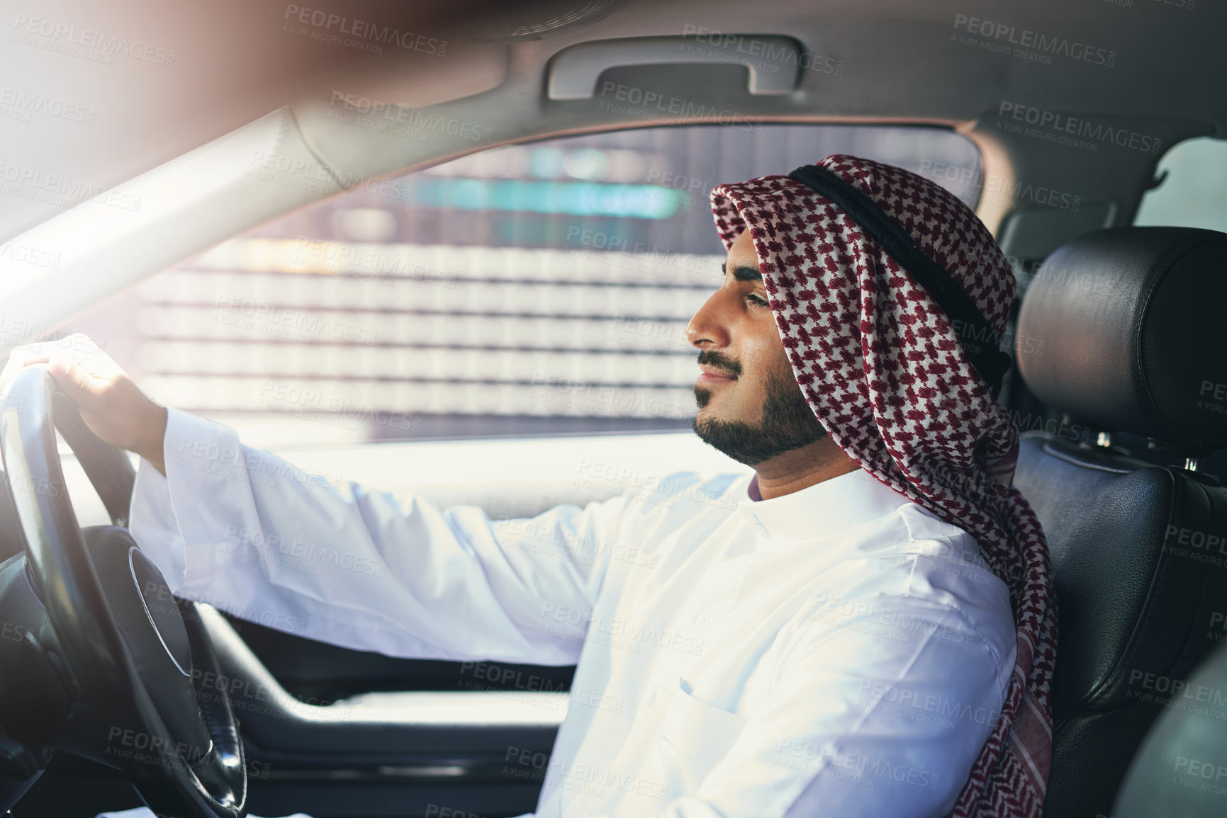 Buy stock photo Arabic man, car and driving in city for work, travel and transportation for business or job. Chauffeur, entrepreneur or luxury vehicle for commute to hotel from airport with global flight in Dubai