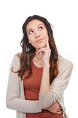 Buy stock photo Shot of a happy young woman looking thoughtful while posing in the studio