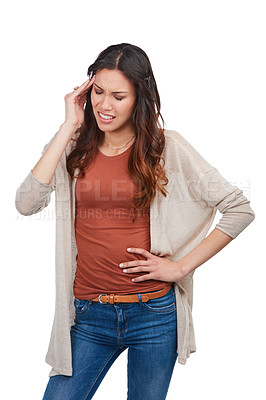 Buy stock photo Shot of a young woman with a headache holding her head in studio