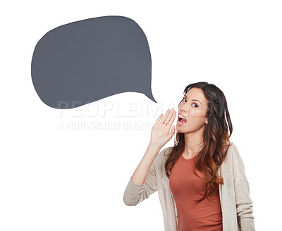 Buy stock photo Portrait of a confident young woman posing with a speech bubble in studio