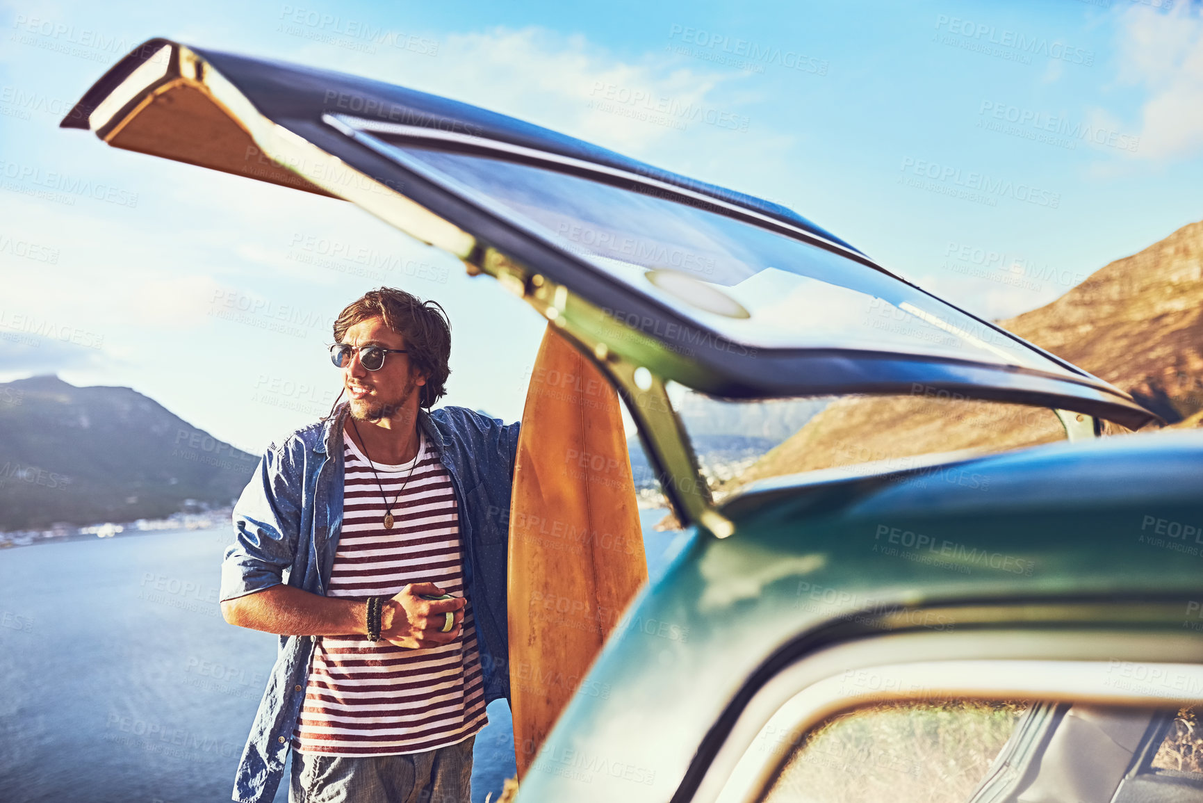 Buy stock photo Outdoor, man and travel with car, road trip and ready for adventure, tourism and surfboard for beach. Thinking, sunglasses and person in summer with transport to sea, surfer and holiday in Australia