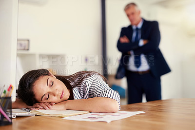 Buy stock photo Cropped shot of a businesswoman sleeping at her desk with her boss standing in the background