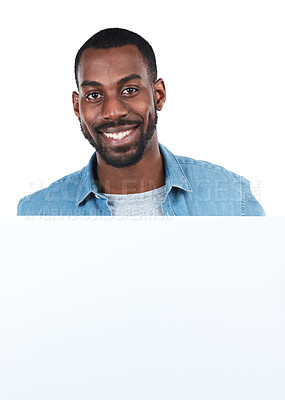 Buy stock photo Face, portrait and black man with poster for mockup, marketing or advertising space in studio isolated on a white background. Product placement, branding and male with banner for mock up or promotion