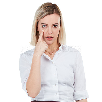 Buy stock photo Portrait, eye and serious with a business woman in studio isolated on a white background showing her eyeball. Face, vision and pointing with a female employee making a rude gesture on blank space