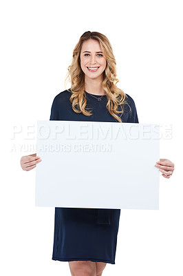Buy stock photo Woman holding a sign or poster marketing and advertising a brand with a mock up isolated in a studio white background. Portrait of a happy and smiling person showing a board or space for a sale