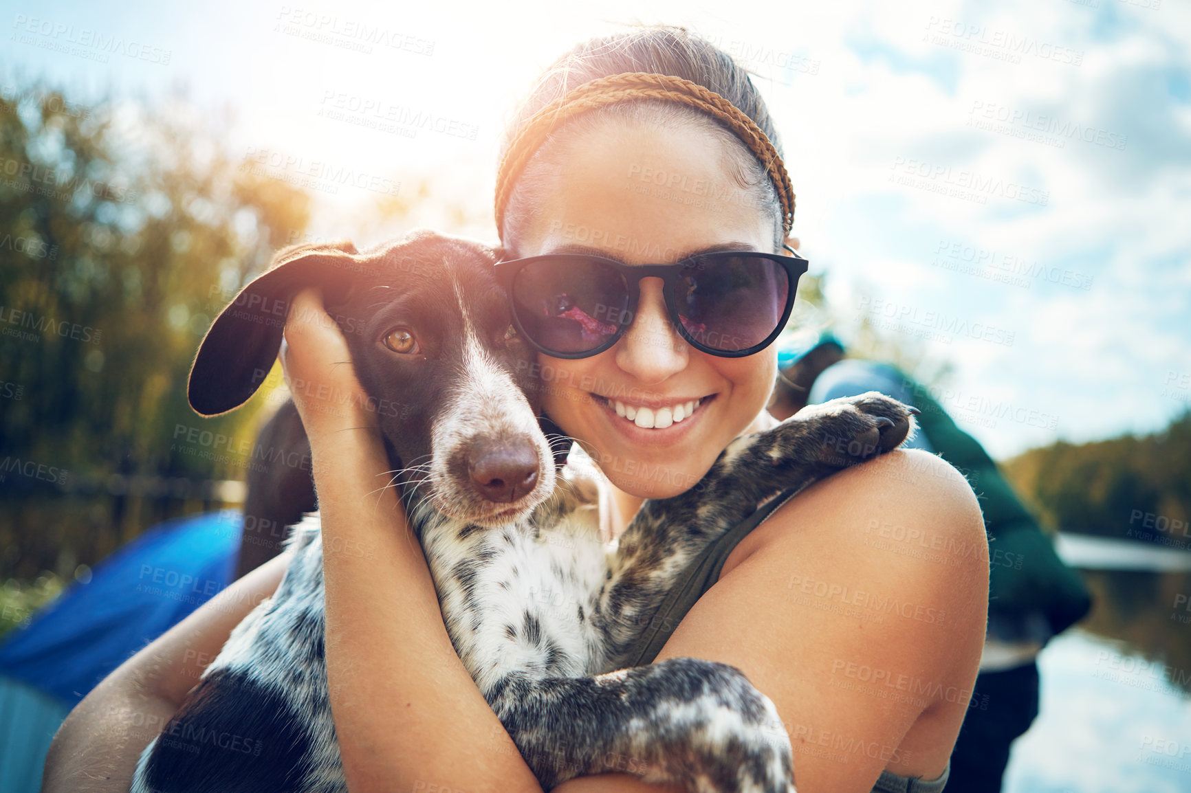 Buy stock photo Woman, portrait and dog with love for camping in forest, sunshine and together for smile by support of adventure time. Happy, female person and puppy as pet with care, hug or relax in summer journey