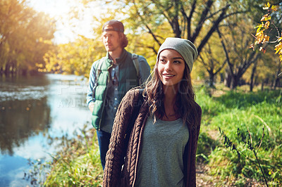 Buy stock photo Cropped shot of an affectionate young couple spending a day in nature