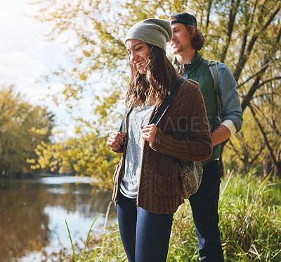 Buy stock photo Cropped shot of an affectionate young couple spending a day in nature