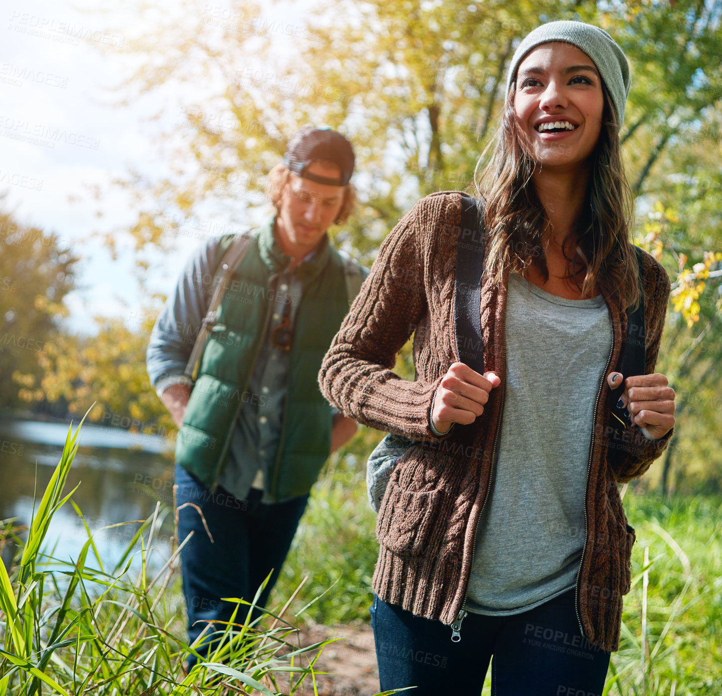 Buy stock photo Cropped shot of an affectionate young couple spending a day in nature