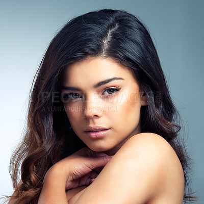 Buy stock photo Indian woman, hair and portrait in studio for wellness, cosmetics or shampoo shine results on grey background. Glow, beauty and face of girl model with haircare pride, volume or balayage satisfaction