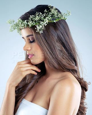 Buy stock photo Woman, hand and flower crown for beauty, skincare and organic for wellness on white background. Person, plant and natural cosmetics for female model in studio and cosmetology, thinking or calm