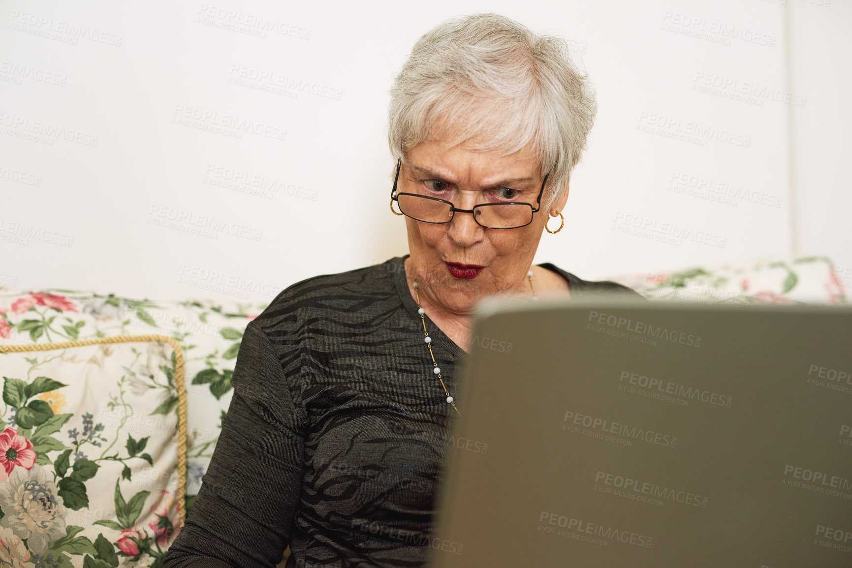 Buy stock photo Senior woman, shock and laptop in house with internet for watch film, social media and streaming video. Elderly lady, surprise and computer with wow for fake news and online article for pension scam