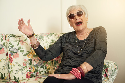 Buy stock photo Portrait, elderly woman with sunglasses for fun, retirement and crazy or silly expression on sofa. Cool person, senior lady and comic face on couch for comedy joke with funny meme and goofy happiness