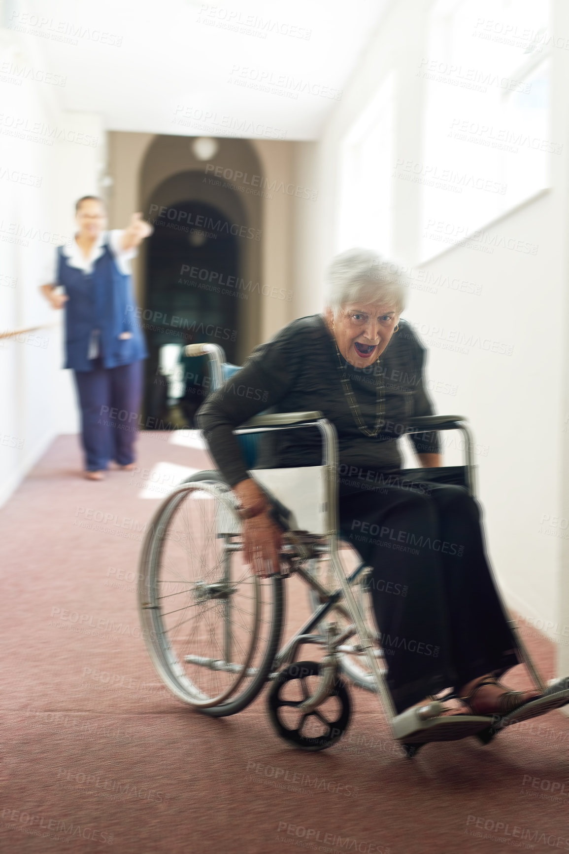 Buy stock photo Senior woman, wheelchair and running from caregiver at nursing home, safety or dementia. Caretaker, elderly female and avoid doctor in hallway, person with disability or elopement in care facility