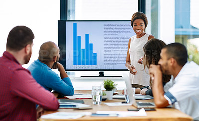 Buy stock photo Cropped shot of a young female designer giving a presentation in the boardroom