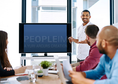 Buy stock photo Cropped shot of a young male designer giving a presentation in the boardroom